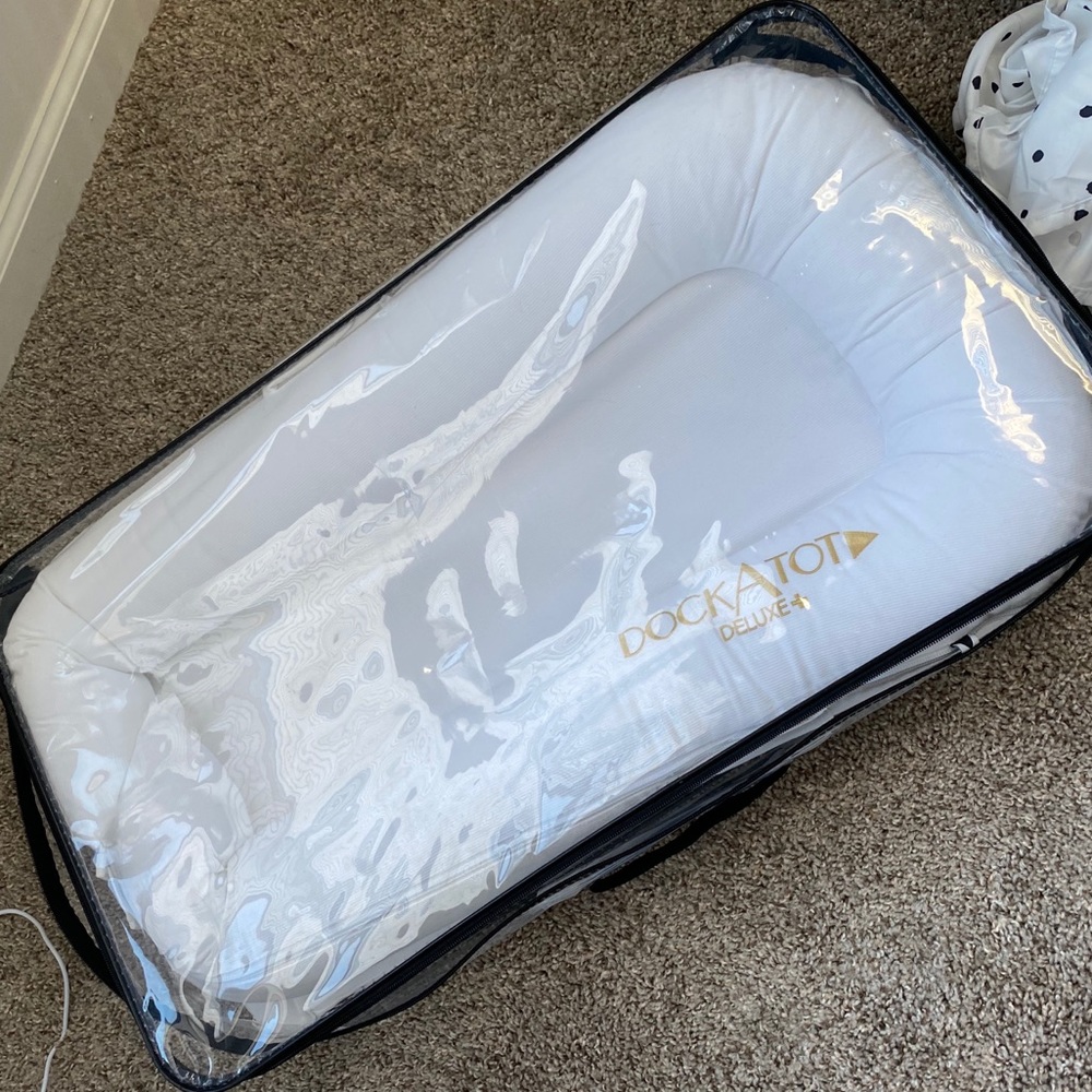 Barely used Dock a tot deluxe !!